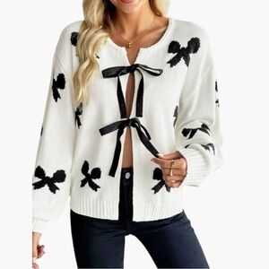 1000. Women's White Sweater with Black Bow Accents